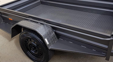 Trailer with hammertone coating